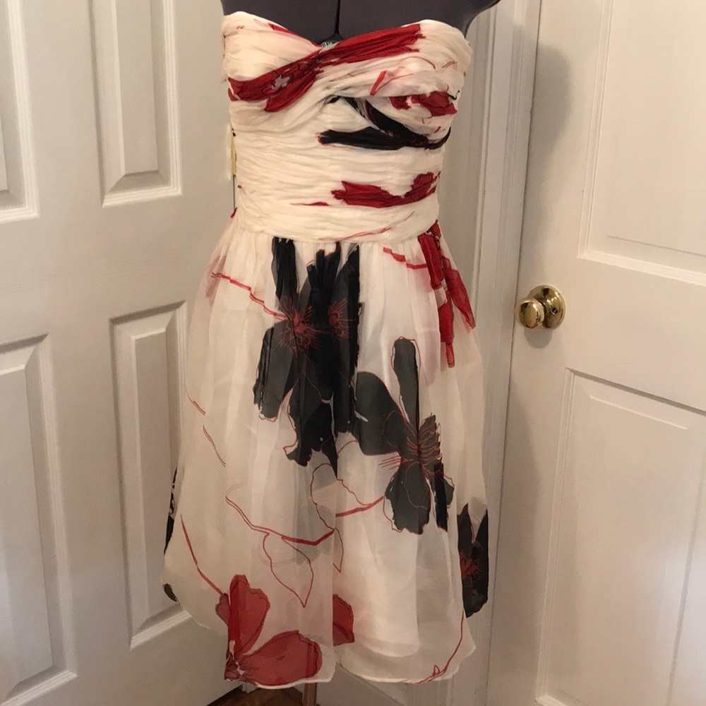 Cream colored cocktail dress w/ black & red print